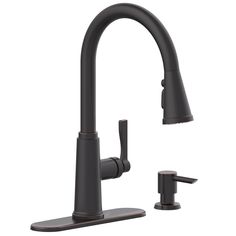 a black faucet with two handles and nozzles on the side, is shown