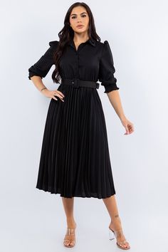 Introducing our stunning black pleated midi dress, perfect for any occasion! This dress features an adorable detached belt, adding a touch of elegance to your look. Our dress also includes a 3/4 sleeve with elastic cuffs, stretch waist and a beautiful pleated skirt for a comfortable and flattering fit. The button down bodice with collar adds a sophisticated touch to this dress. Made with a lightweight woven fabric, you'll feel amazing in this flowy and stunning dress. Model is 5'7"  and wearing Girls Accesories, Plus Jumpsuit, Black Dress With Sleeves, Belted Midi Dress, Tea Length Dresses, Dress With Belt, Pleated Midi Dress, Pleated Midi Skirt, Plus Dresses