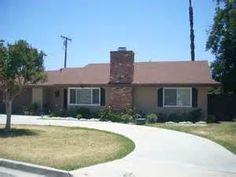 a house with a driveway in front of it