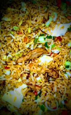 rice and vegetables mixed together in a bowl