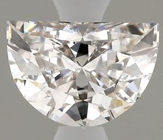 a diamond cut in half on a white background