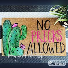 a door mat that says no pricks allowed with a green cactus and pink flowers