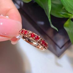 At our establishment, we take pride in guaranteeing the authenticity of every gemstone. Each piece of jewelry features natural stones sourced from the world's most renowned regions. Our rubies are procured from Mozambique and Sri Lanka, while our sapphires are exclusively from Sri Lanka. Our emeralds are sourced from Zambia and Colombia, with tourmalines and amethysts originating from Brazil. Additionally, our opals are from Australia and Ethiopia. Rest assured, all our gold is of the highest ca Anniversary Rose Gold Ruby Ring, Rose Gold Ruby Ring In Fine Jewelry Style, Rose Gold Ruby Ring With Round Cut, Rose Gold Ruby Ring For Promise, Rose Gold Ruby Birthstone Ring With Accent Stones, Rose Gold Ruby Gemstone Promise Ring, Lab-created Ruby Ring In Rose Gold With Prong Setting, Heirloom Multi-stone Ruby Ring For Formal Events, Anniversary Rose Gold Lab-created Ruby Ring