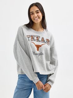 Cozy with no shortage of school spirit, the Women’s Wrangler Collegiate Southwest Sweatshirt will become your go-to on cooler game days. It’s crafted from a comfortable cotton blend with a fleece-like feel that will warm you up as you cheer your team on. This classic crew sweatshirt also comes with your team’s name and logo printed across the chest for an official look that’ll have no one doubting whose side you’re on. Relaxed Fit College Style Tops For Campus, Relaxed Fit Tops For College Campus, Relaxed Fit Tops For College Campus Style, Collegiate Tops With Embroidered Graphics For College, Collegiate Relaxed Fit Tops For Campus, Embroidered Fall College Top, Collegiate Style Relaxed Fit Top For Campus, Embroidered Graphic Tops For College In Fall, Fall College Top With Embroidered Graphics