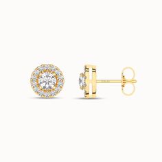 The Round Halo Studs feature a center diamond embraced by smaller round gems in a micro pave setting—a symphony of brilliance and delicate design echoing the beauty of the diamonds. With a vintage-style charm, these studs encapsulate the magic of timeless designs. 14k Gold Halo Setting Earrings, Timeless Halo Setting Round Cut Earrings, Yellow Gold Round Halo Earrings, Halo Cubic Zirconia Round-cut Earrings, Multi-stone Cubic Zirconia Round Earrings, Round Halo, Pave Setting, Micro Pave, Keepsake Boxes