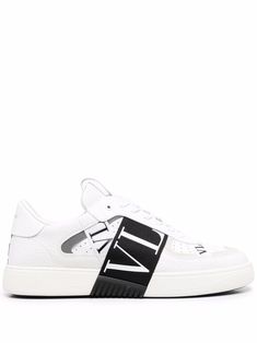 White/black leather VL7N low-top sneakers from VALENTINO GARAVANI featuring round toe, front lace-up fastening, logo-print strap, perforated detailing, logo patch at the tongue and flat rubber sole. Detailing Logo, Sneakers White, Leather Sneakers, Valentino Garavani, Logo Print, Low Top, Patch Logo, Lace Front, Top Sneakers