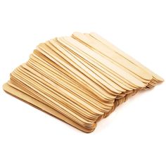 a pile of wooden chopsticks sitting on top of each other