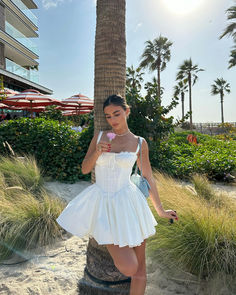 Elegant Mini Corset Dress For Beach, Elegant Beach Corset Dress Mini Length, Fitted Mini Corset Dress For Beach, Beach Mini Length Fitted Corset Dress, Summer Fit And Flare Mini Corset Dress, Beach Mini Corset Dress, Fitted Mini Length Suspender Dress For Day Out, Fitted Mini Length Suspender Dress For Brunch, Fitted Mini Suspender Dress For Day Out