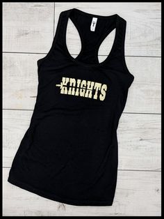 Wear this UCF Knights tank top to the next game or just show your support for the UCF Knights! Our tanks are made using 60% combed ringspun cotton & 40% lightweight polyester jersey. Child sizes available in full back tank upon request. If you're looking for an alternate style, please refer to our other listing below! Shirt care Please turn shirt inside out and wash in cold water using a mild detergent, gentle cycle. Do not use bleach as it can damage the artwork. Hang dry or low heat. Pleas Fitted Tank Tops For Sports Season, Fitted Sleeveless Team Spirit Tops, Fitted Sleeveless Top For Team Spirit, Cotton Scoop Neck Tank Top For Sports, Sporty Screen Print Tank Top For Streetwear, Sporty Cotton Tank Top With Screen Print, Black Racerback Tank Top With Letter Print, Racerback Top With Graphic Print For Sports, Racerback Sports Top With Graphic Print