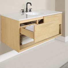 a bathroom vanity with two drawers and a sink