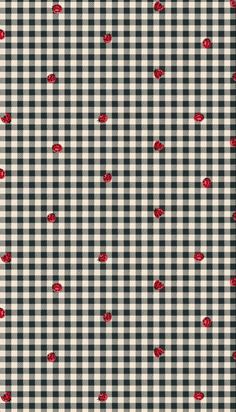 a black and white checkered fabric with red hearts