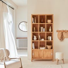 a living room filled with furniture and decor