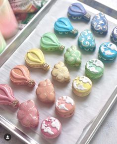 there are many different shaped cookies on the tray