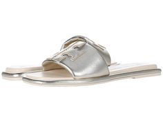 Tory Burch Double T Sport Slide - Women's Shoes : Spark Gold/New Cream/Gold : Slip right into style and comfort with Tory Burch Double T Sport Slides! Upper, lining, and insole made of leather material. Slip-on construction. Iconic Tory Burch double T logo on vamp. Open snip-toe silhouette. Man-made outsole. Imported. Measurements: Weight: 7 oz Product measurements were taken using size 9, width M. Please note that measurements may vary by size. Weight of footwear is based on a single item, not Silver Leather Slides With Cushioned Footbed, Casual Silver Leather Slides, Luxury Beach Slides With Tang Buckle, Tory Burch Bubble Slides, Luxury Flat Slides With Buckle Closure, Tory Burch Charm Mules, Tory Burch Flats New, T Logo, Slides Women