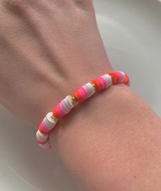 red, pink and white themed bracelet!🤍 Perfect gift for your anyone!!  - SIZING :: this bracelet size ranges from 15 - 18 cm  - you can wear it out or just casually! - 6mm clay beads and 1mm gold beads. - suitable for ages 3+ because of small pieces. Pink Heishi Beads Stretch Bracelet, Everyday Pink Beaded Bracelets With Letter Beads, Everyday Pink Heishi Beads Stretch Bracelet, Trendy Pink Heishi Beads Friendship Bracelet, Pink Stretch Bracelet With Colorful Beads For Everyday, Everyday Pink Stretch Bracelet With Colorful Beads, Pink Heishi Beads Bracelets For Friendship, Pink Heishi Beads Stretch Bracelet For Friendship, Pink Heart Beads Friendship Bracelet