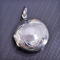 1", Vintage textured circle sterling silver 925 photo locket pendant, stamped 925 Etched Sterling Silver Round Disc Jewelry, Silver Stamped Oval Pendant Jewelry, Sterling Silver Keepsake Locket Necklace, Sterling Silver Keepsake Locket Necklace With Round Pendant, Sterling Silver Locket Necklace For Keepsake, Silver Etched Round Pendant Jewelry, Round White Gold Locket Jewelry, Silver Stamped Round Disc Jewelry, Stamped Silver Round Disc Jewelry