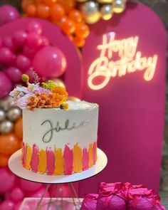 a birthday cake sitting on top of a table