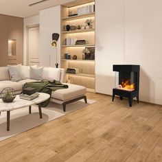 a living room with wood floors and a fire place