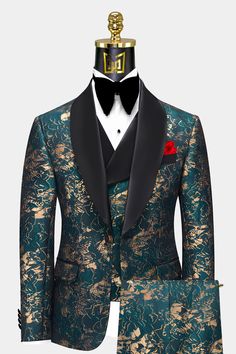 The Gentleman's Guru Abstract Teal and Gold Tuxedo is a timeless and sophisticated piece for the modern man. This 3-piece set features a slim fit cut that provides a flattering and comfortable fit, perfect for making a stylish statement at any formal event. With the custom size option, you can tailor the suit to your specific body type for an effortless and confident look. The exotic abstract pattern in teal and gold is sure to make you stand out in a crowd, adding a touch of personality to your Green Tuxedo, Gold Suit, Prom Tuxedo, Classy Suits, Party Suits, Tuxedo Wedding