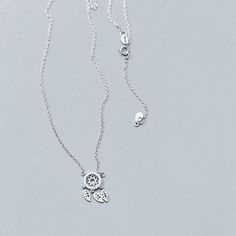 Made of solid 925 sterling silver with platinum plating, this dainty necklace features dream catcher pendant design with cubic zirconia decoration, dainty cable chain. Featuring exquisite details and premium materials, this dream catcher pendant necklace is the perfect combination of elegance and charm. Crafted from solid 925 sterling silver and plated with platinum, its delicate design is adorned with sparkling cubic zirconia, adding a touch of glamour to your everyday look. The dainty cable ch Dream Catcher Necklace, Delicate Design, Sterling Silver Necklace Pendants, Pendant Design, Dainty Necklace, Silver Pendant Necklace, Sterling Silver Pendant, Cable Chain, Solid 925 Sterling Silver