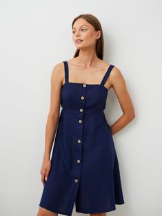 "INDIE is a simple strappy linen mini button down dress. DETAILS - Above knee length - Spaghetti straps - Coconut buttons - Oeko-Tex certified 100% lightweight linen - Cut and sewn to order just for you in our studio COLOR - Navy Blue, you can also choose other colors above - Fabric samples are available here https://www.etsy.com/listing/586569696/linen-fabric-samples SIZING & FIT - Fits true to size - Model is 5'10\" / 178cm and wearing a size S CARE FOR LINEN - Machine wash up to 30ºC/86ºF gentle cycle - Lay flat to dry or tumble dry low - Warm iron if needed - Do not bleach SIZE GUIDE Size conversion guide Size XS (US 0-2, IT 36-38, UK 4-6, Japan 3-5, France 32-34) Size S (US 4-6, IT 40-42, UK 8-10, Japan 7-9, France 36-38) Size M (US 8-10, IT 44-46, UK 12-14, Japan 11-13, France 40-42) Mini Linen Dress With Adjustable Straps, Casual Square Neck Mini Dress With Buttons, Casual Mini Dress With Square Neck And Buttons, Summer Linen Mini Dress With Buttons, Buttoned Linen Mini Dress, Summer Linen Mini Dress With Adjustable Straps, Summer Mini Dress With Buttons And Square Neck, Linen Mini Dress With Buttons, Buttoned Mini Dress For Vacation