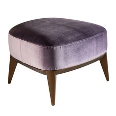 a purple ottoman with wooden legs on a white background