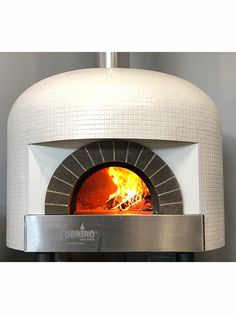 an open brick oven with flames in it