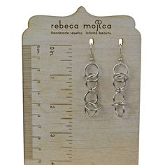 These lightweight earrings pair well with the Airy Orbital necklace. Earrings measure approximately 2.5" long. Stainless steel links and earwire. Light Weight Earrings, Dog Tag Necklace, Handmade Jewelry