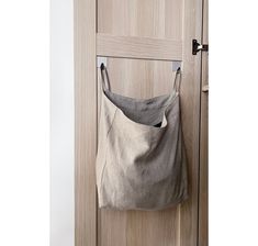 a handbag hanging on the door handle