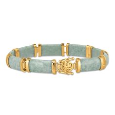 ONE-OF-A-KIND GLAMOUR Nine lustrous jade links that envelop the wrist with luxury.Glistening 14kt gold-plated details add the perfect warm accent to the cool jade.An intricately crafted clasp featuring the ancient Chinese character for “Good Luck, Good Fortune.”Resting on the pulse, the bracelet’s meaning is strengthened and united to the spirit of the wearer.Connect to and embody grace, wisdom, prosperity and more. Gold Jade Bangle Bracelet, Elegant Gold Jade Bracelets, Classic Gold Jade Jewelry, Elegant Yellow Gold Jade Bracelets, Elegant Yellow Gold Jade Bracelet, Classic Jade Bracelets For Formal Occasions, Luxury Jade Bracelets For Formal Occasions, Luxury Gold Jade Bracelets, Formal Jade Bangle Bracelet