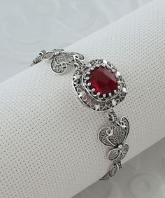 "Ruby Silver Gothic Filigree Square Women Bracelet, 925 Sterling Silver Artisan Handmade Bracelet Jewelry, Ruby Red Crystal Quartz Gemstones red quartz bracelet, Owl bracelet, july bracelet, birthstone bracelet, goth girl bracelet Gemstone Ruby Quartz  12 mm 6ct. Matching Pendant Necklace; www.etsy.com/listing/1389500440 Ruby is the July birthstone - and it's one of the most coveted of gems. The name is derived from the Latin word ruber, meaning \"red\" - the color of love and passion. Material: Red Ruby Bracelet Jewelry, Red Bracelets With Intricate Design, Ruby Filigree Jewelry Gift, Vampire Bracelet, Victorian Gothic Jewelry Red, Hand-set Ruby Bracelet In Silver, Gothic Red Ruby Jewelry, Gothic Filigree, Red Ruby Bracelet