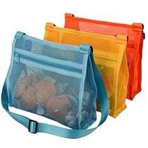 three mesh bags filled with oranges and lemons, one in blue the other in yellow