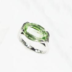 Vintage 1950's 10k white gold light green stone ring. The stone is a lab grown spinel and has a pineapple cut. This ring is a size 6.75, and can be sized. Center Stone Measurements: 13mm x 9.5 Green Oval Topaz Ring In Sterling Silver, Classic Green Amethyst Rings, Formal Green Oval Birthstone Ring, Antique Ring Box, Green Stone Ring, Green Stone Rings, Gold Light, Stone Engagement Rings, Orange Gold