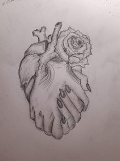 a pencil drawing of a heart and hand holding a rose