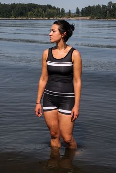 The bestselling Original, a unisuit with shorts. Made for everyone on the gender spectrum. Fitted Lightweight Black Activewear, Compressive Summer Swimwear For Training, Fitted Black Swimwear For Outdoor, Fitted Black Outdoor Swimwear, Black Summer Activewear In Recycled Polyester, Black Recycled Polyester Activewear For Summer, Black Recycled Polyester Summer Activewear, Sporty Fitted Swimwear For Outdoor, Lightweight Fitted Nylon Activewear