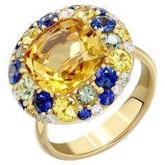 Ring Yellow 18 K Gold (Matching Earrings Available) Weight 8,05 gramm Size US 7 Diamond 1-Round-0.05ct-3 / 5A Diamond 7-Round-0,12ct-3 / 5A Citrine 1- Square-3,95 ct 2 / 1A Green Sapphire- 9-0.64ct Sapphire Blue 12-Circle-1.2ct T (3) / 2A Yellow Sapphire With a heritage of ancient fine Swiss jewelry traditions, NATKINA is a Geneva based jewellery brand, which creates modern jewellery masterpieces suitable for every day life. It is our honour to create fine jewelry, and it’s for that reason that Modern Jewellery, Tanzanite Diamond Ring, Diamond Rings Design, Colour Stone, Sparkly Jewelry, Jewellery Brand, Gold Cocktail Ring, Gold Cocktail, Diamond Ring Settings