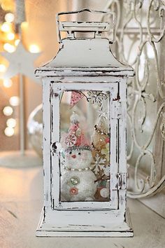 an old white lantern is displayed on the twitter page for shabby chic christmas