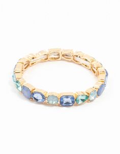 Add a striking blue touch to your favorite outfits with this eye-catching cluster stretch bracelet. With its gold base and dazzling blue diamante crystals, it creates an effortlessly cool statement that's perfect for any occasion, day or night. Material: Crystal Color: Blue Dimensions: Diameter: 5.5 cm Width: 10 mm | Lovisa Gold Blue Cluster Bracelet 60s Party, Cluster Bracelet, Cluster Bracelets, Stretch Bracelet, Stretch Bracelets, Favorite Outfit, Color Blue, Bracelet, Crystals