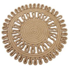 a round rug made out of jute with an intricate design on the center and sides