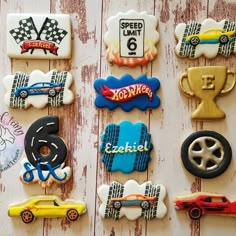 decorated cookies are arranged on a wooden surface with the words speed limit written in different languages