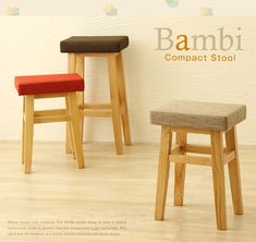 two stools sitting next to each other in front of a wall with the words bamboo compact stool