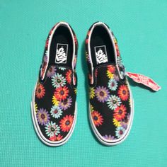 Nice Black Canvas With Peace Floral Design And White Sole Vans Slip-on Sneakers For Spring, Vans Floral Print Summer Sneakers, Vans Floral Print Sneakers For Summer, Vans Cushioned Sneakers For Summer, Vans Sneakers With Cushioned Footbed For Summer, Black Vans Sneakers For Summer, Black Floral Print Sneakers For Spring, Authentic Vans, Womens Vans