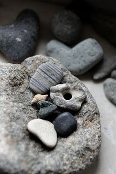 rocks and stones arranged on top of each other in the shape of heart shaped shapes