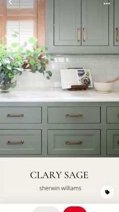 a kitchen with green cabinets and white counter tops, along with the words clayy sage written on it