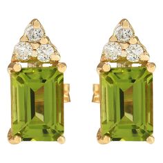 Stamped: 14K Yellow Gold Total Earrings Weight: 1.2 Grams Total Natural Peridot Weight is 2.50 Carat (Measures: 7.00x5.00 mm) Color: Green Total Natural Diamond Weight is 0.15 Carat Color: F-G, Clarity: VS2-SI1 Face Measures: 11.95x5.00 mm Sku: [703310W] Yellow Gold Diamond Earrings, Peridot Stone, August Birthstone, Gold Diamond Earrings, Peridot Gemstone, Colored Gems, Green Diamond, Green Peridot, August Birth Stone