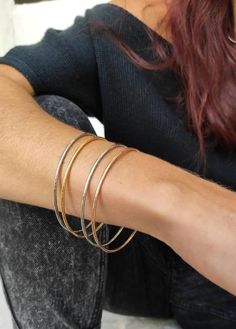 bangle braceletsilver braceletevery day braceletsilver cuff braceletcuff braceletwide cuff braceletgold bracelet cuffgold braceletgifts for hervintage banglesrose gold braceletrose gold bangledainty braceleDainty bangle bracelet!This handmade bracelet is an elegant piece. Its made from stainless steel and you can pick between 24k gold plated, 925  silver plated or Rose gold plated!You can wear it every day, the most important is that is anti allergic and nickel free!*** The listing is for ONE si Trendy Stackable Bangle Jewelry, Metal Bangle For Everyday Wear, Nickel-free Bangle Bracelet For Everyday, Everyday Metal Bangle, Silver Everyday Bangle Bracelet, Everyday Bangle Bracelets, Silver Hoop Bangle For Gift, Rose Gold Everyday Cuff Bracelet, Everyday Rose Gold Bangle Jewelry