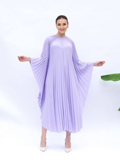 Elegant Flowy Spring Abaya, Bohemian Pleated Maxi Dress For Party, Elegant Summer Abaya, Elegant Purple Kaftan For Party, Elegant Purple Party Kaftan, Elegant Purple Floor-length Kaftan, Elegant Purple Evening Kaftan, Elegant Floor-length Purple Kaftan, Pleated Billowy Party Maxi Dress