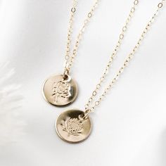 · 1/2" (12.7mm) disc· 14k yellow gold fill, 14k rose gold fill, and sterling silver options· Sturdy, timeless, and built to be worn everydayOur classic 1/2” necklaces are easy to layer, elegant, and ready to be personalized with your most special sentiments, moments, and memories! Created to last a lifetime, these necklaces will remain evergreen even as the years and trends come and go.Personalizing your piece with a message? Reference our fonts and symbols chart for font options and character m