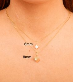 This 14k Gold Dice Charm Necklace is crafted from pristine 14k yellow gold. Its 3D cubed dice charm pendant will make a statement of sophistication and class. Perfect for any special occasion or as a stylish everyday accessory. Diamond-shaped Jewelry With Diamond Markers As Gift, 14k Gold Square Pendant With Box Chain, 14k Gold Box Chain With Square Pendant, Yellow Gold Jewelry With Diamond Markers For Gift, Asscher Cut Yellow Gold Jewelry Gift, Asscher Cut Gold Jewelry For Gift, 14k Yellow Gold Jewelry With Diamond Markers, Gold Jewelry With Diamond Markers In 14k Gold, Gold Asscher Cut Jewelry Gift