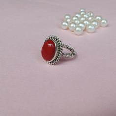 Handmade Red Coral bohemian ring, you can wear this ring as a party wear ring .. Title - Red Coral silver ring    Stone color - Red Coral  Stone shape - Oval Material - Sterling silver 925 Note - THIS CORAL STONE IS NOT NATURAL, IT IS LAB CREATED STONE, IF YOU WANT THE REAL CORAL STONE RING YOU CAN CONTACT US WE WILL PROVIDE YOU THE BEST PRICE FOR THE REAL CORAL STONE... we are giving you the best quality rings at the best price. contact us for more quantity Bohemian Crystal Wedding Ring, Adjustable Red Crystal Promise Ring, Red Minimalist Jewelry For Wedding, Minimalist Red Jewelry For Wedding, Minimalist Rings For Summer Gifts, Adjustable Red Gemstone Rings, Elegant Silver Rings For Summer, Red Gemstone Toe Ring, Red Toe Ring As Gift